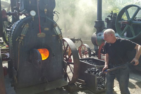Hollycombe-volunteer-David-Shrub-helping-create-steam-at-Hollycombes-Steam-in-Miniature-Weekend.jpg