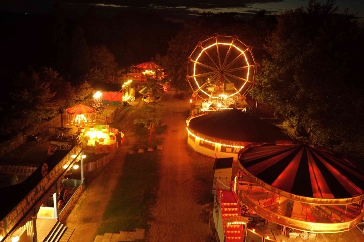 The Hollycombe Fairground at Night